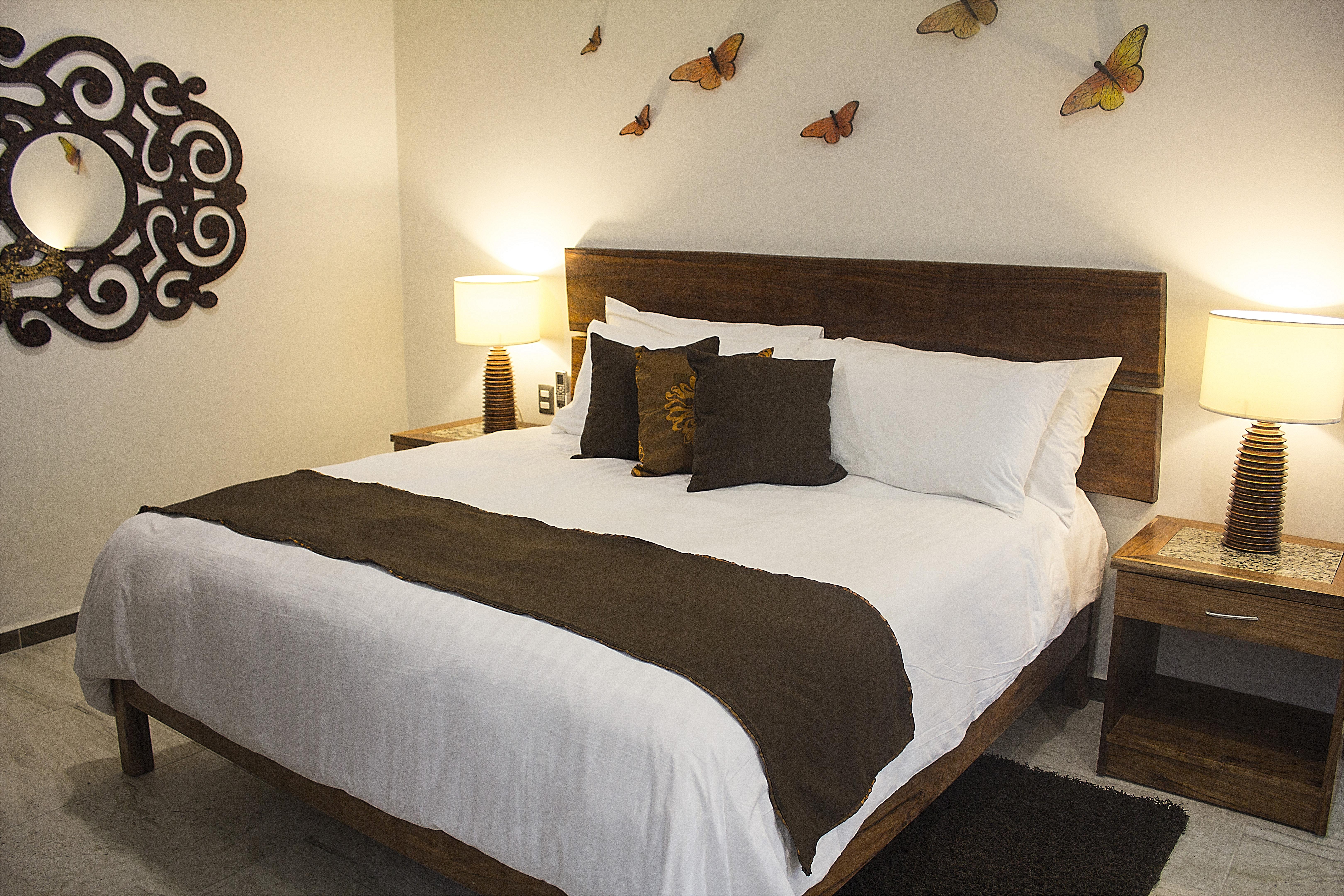 Casa Ticul Hotel Boutique - 5Th Ave (Adults Only) 普拉亚卡门 外观 照片 A bed with a bed runner