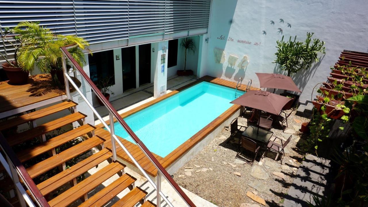 Casa Ticul Hotel Boutique - 5Th Ave (Adults Only) 普拉亚卡门 外观 照片 A swimming pool in a courtyard