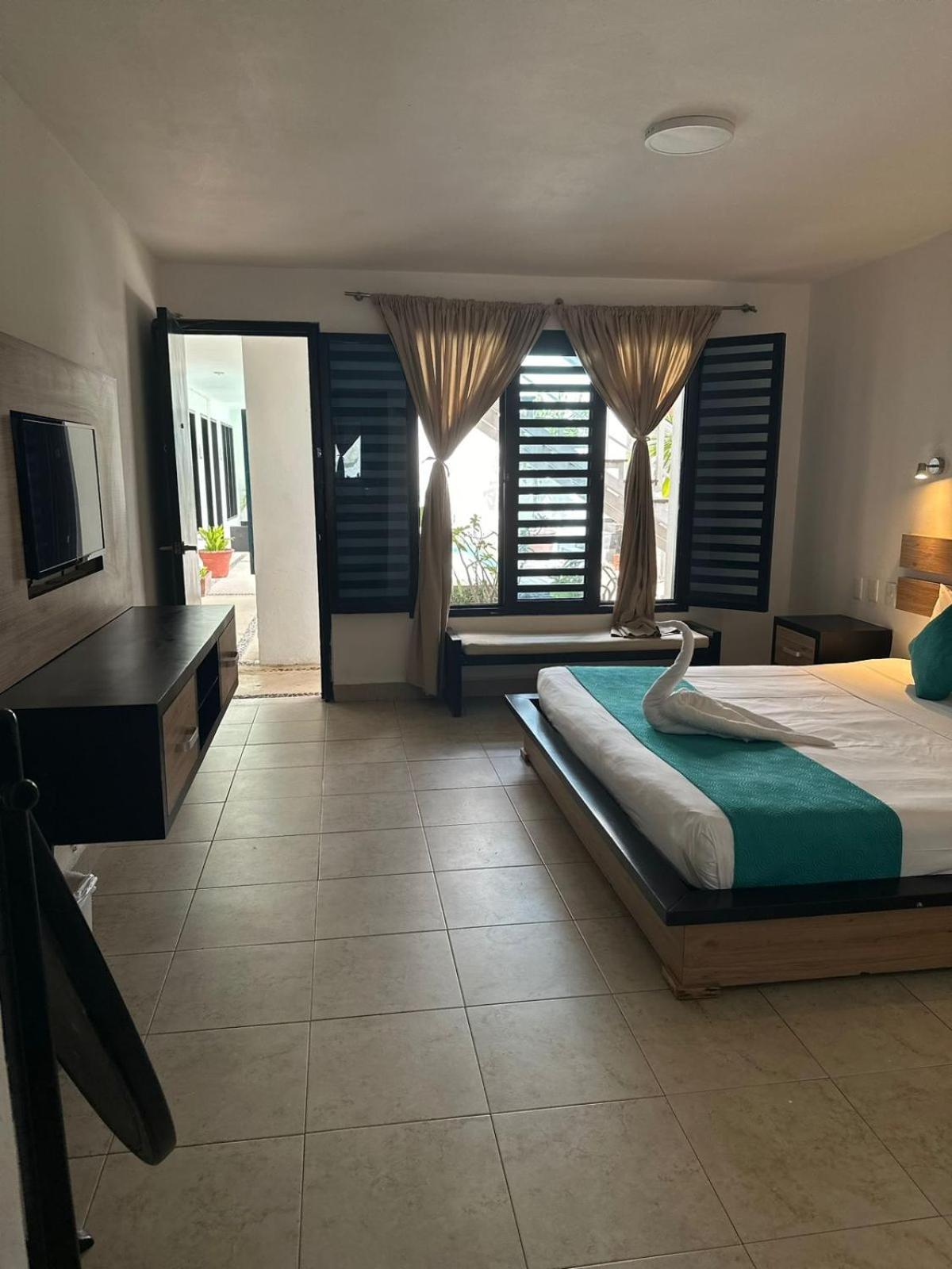 Casa Ticul Hotel Boutique - 5Th Ave (Adults Only) 普拉亚卡门 外观 照片 A room at the hotel